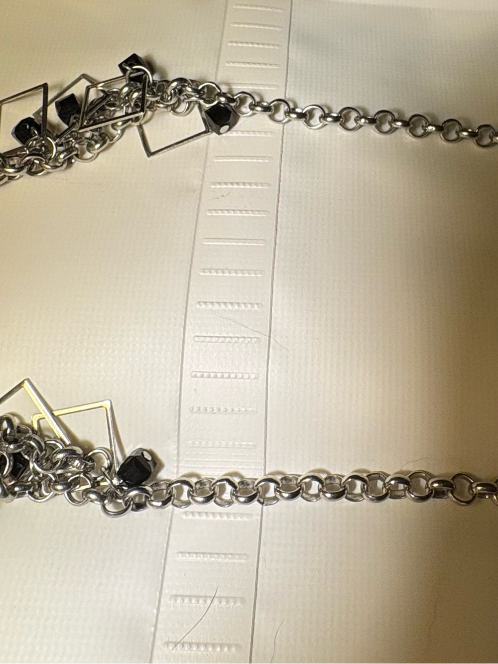 Silver Chain Link Necklace with Black Geometric Accents